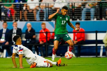 Jun 15, 2023; Las Vegas, Nevada, USA; Mexico midfielder Orbelin Pineda (17) controls the ball against USA defender Miles Robinson (12) during the first half at Allegiant Stadium. Mandatory Credit: Lucas Peltier-USA TODAY Sports