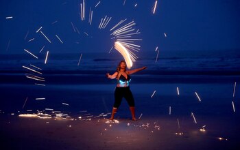 An artist performs ahead of