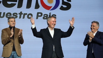 Juan Schiaretti junto a Florencio