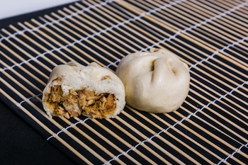 Recetas de baozi, un panecillo al vapor relleno de cerdo (Magnific)