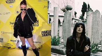 Collage con una mujer de gafas oscuras y botas ante un panel amarillo, y otra toma de ella con capucha frente a lápidas de piedra tallada.