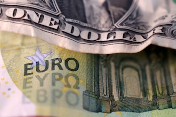 FILE PHOTO: U.S. dollar and Euro banknotes are seen in this illustration taken March 19, 2025. REUTERS/Dado Ruvic/Illustration/File Photo