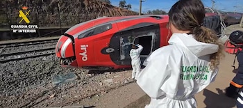 Agentes de Criminalística en el