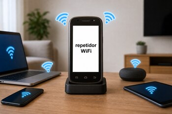 Un teléfono móvil sobre una base con el texto repetidor WiFi transmite señal inalámbrica a una computadora portátil, una tableta y un altavoz.