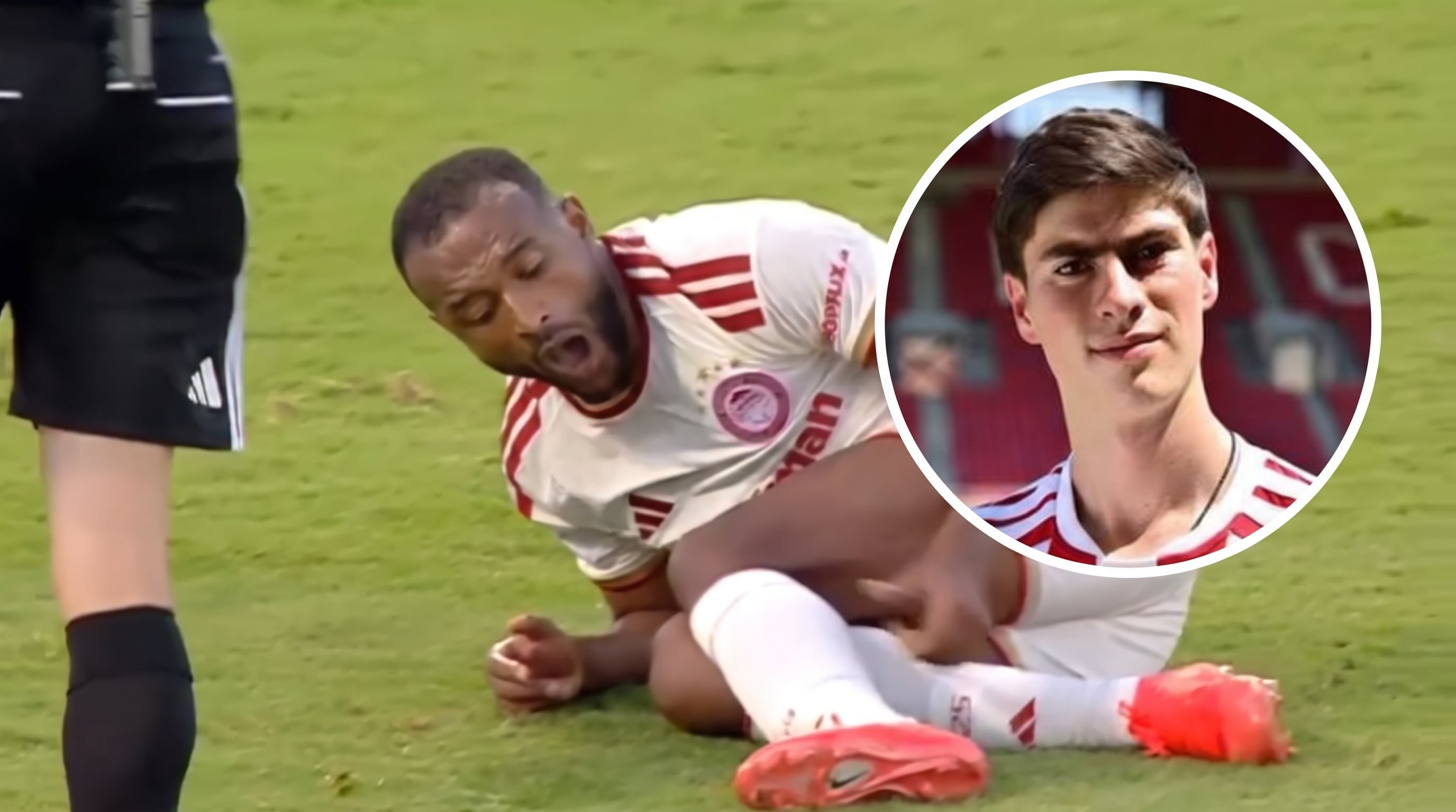 Un jugador del Olympiacos se duele en el terreno de juego tras sufrir un impacto durante un partido de fútbol. (Imagen Ilustrativa Infobae)