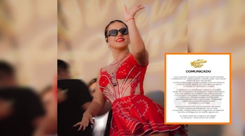 Mujer con vestido rojo y gafas de sol en un escenario, con un comunicado de Las Estrellas de la Cumbia en un recuadro blanco con borde naranja.