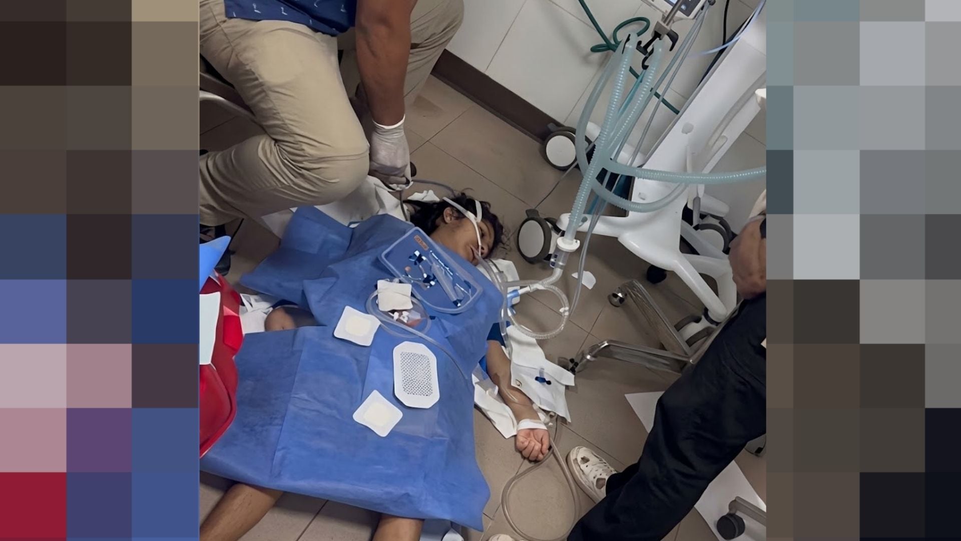 Personal de salud atiende en el suelo a una paciente con equipos de asistencia respiratoria en Lambayeque. (Captura de foto)