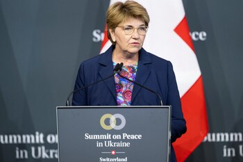 La presidenta suiza y anfitriona