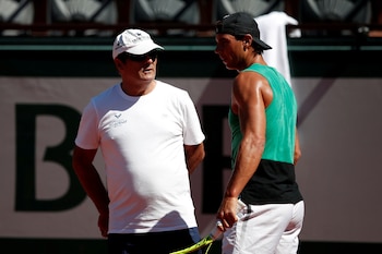 FILE PHOTO: Tennis - French Open - Roland Garros - Paris - 25/05/2017. Rafael Nadal of Spain and his coach Toni Nadal during a training session. REUTERS/Benoit Tessier/File Photo