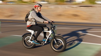 Cyclist rides electric E-bike in California