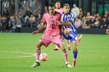 Apr 3, 2024; Fort Lauderdale, FL, USA; Inter Miami midfielder Sergio Busquets (5) blocks Monterrey forward Germán Berterame (9) the second half at Chase Stadium. Mandatory Credit: Reinhold Matay-USA TODAY Sports