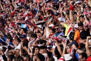Soccer Football - LaLiga - Rayo Vallecano v Real Madrid - Campo de Futbol de Vallecas, Madrid, Spain - February 18, 2024 Rayo Vallecano fans celebrate their first goal scored by Raul de Tomas REUTERS/Ana Beltran
