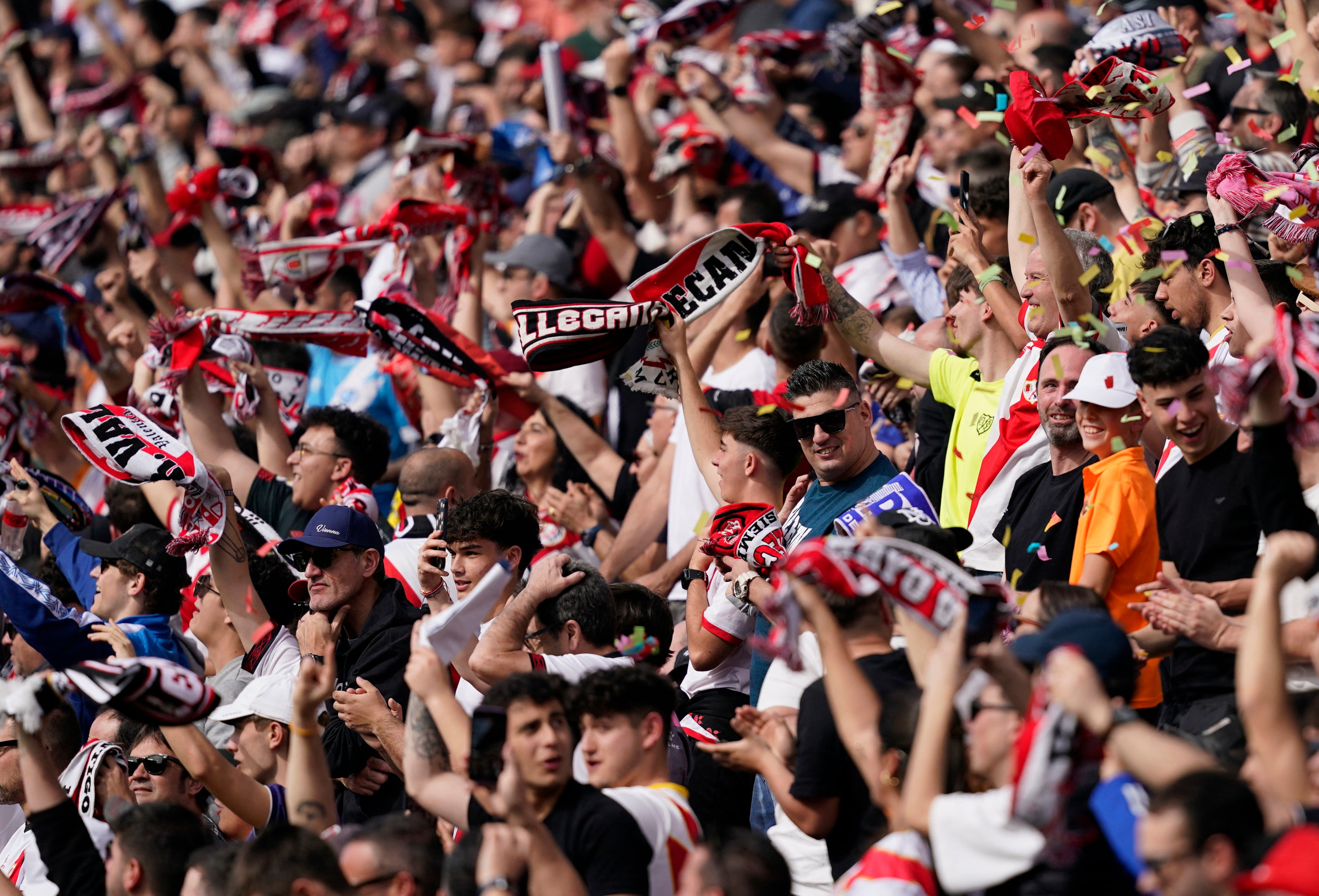 Soccer Football - LaLiga - Rayo Vallecano v Real Madrid - Campo de Futbol de Vallecas, Madrid, Spain - February 18, 2024 Rayo Vallecano fans celebrate their first goal scored by Raul de Tomas REUTERS/Ana Beltran