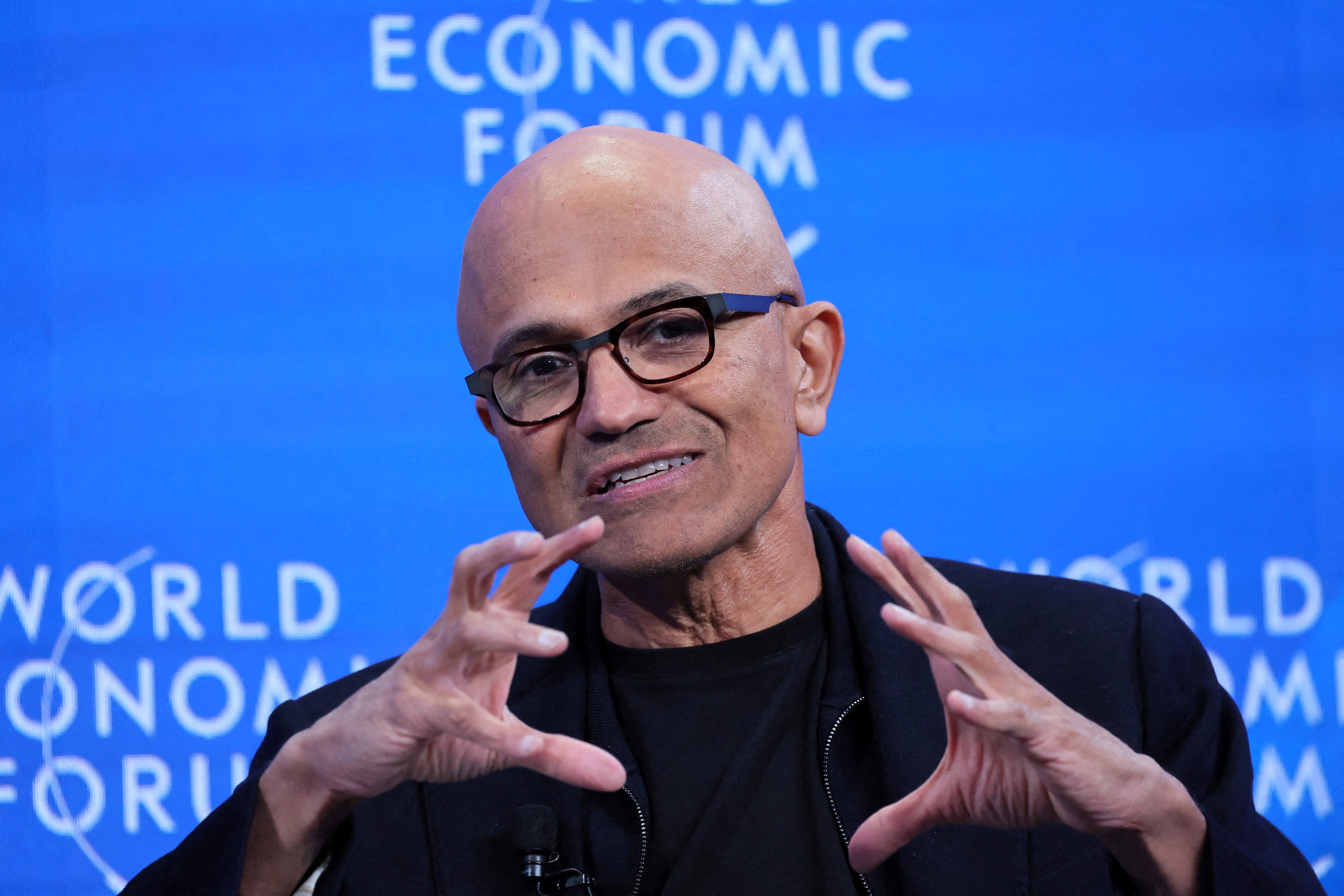 FILE PHOTO: Executive Chairman and CEO of Microsoft Corporation Satya Nadella attends a session during the 54th annual meeting of the World Economic Forum in Davos, Switzerland, January 16, 2024. REUTERS/Denis Balibouse/File Photo