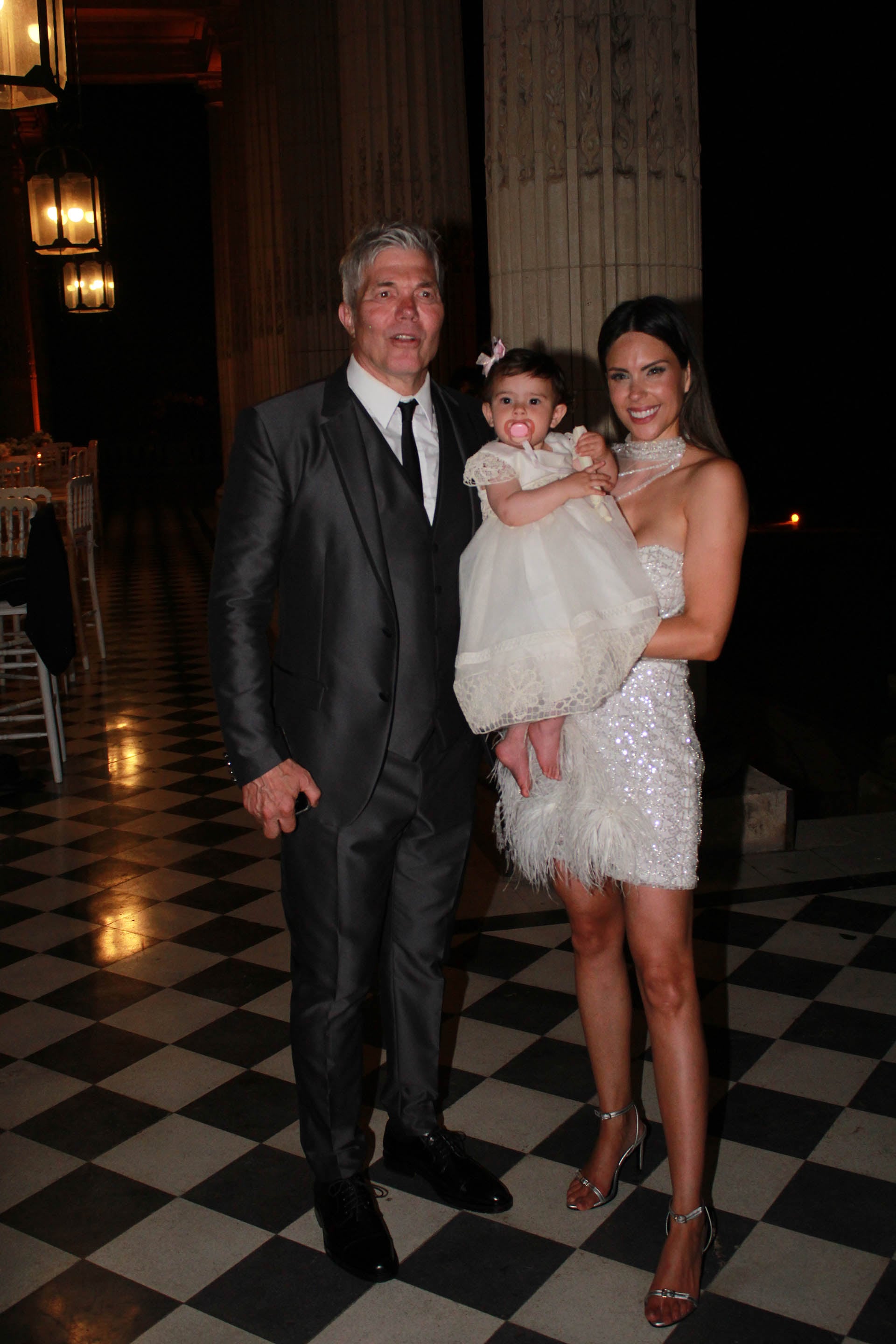 Fernando Burlando, Barby Franco y su hija Sara cuando fue bautizada