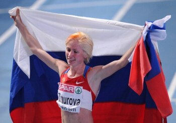 Russia's Yuliya Rusanova celebrates after