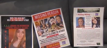 Primer plano de tres carteles de "Persona Desaparecida" para Hailey Athay, de 33 años, con su nombre, varias fotos y detalles de su desaparición