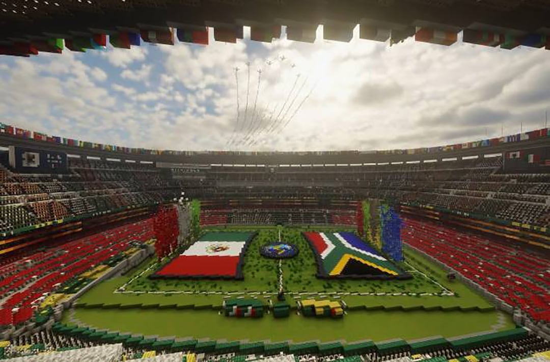 Una panorámica del Estadio Azteca, en la Ciudad de México, intervenido de forma temporal para la ceremonia inaugural de la Copa Mundial de la FIFA 2026, con banderas de México y Sudáfrica (Créditos: Build The Earth México)