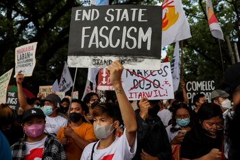 Marcos Sr junto a su