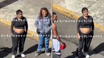 La mujer embarazada se volvió