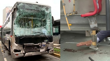 Un bus Metropolitano con parabrisas completamente destrozado y parachoques delantero dañado, y el interior del bus con un asiento rojo inclinado y escombros en el piso.