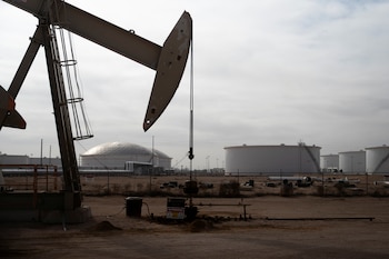 A pump jack operates near a crude oil reserve in the Permian Basin oil field near Midland, Texas, U.S. February 18, 2025. REUTERS/Eli Hartman