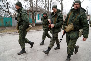 FILE PHOTO: Servicemen of pro-Russian