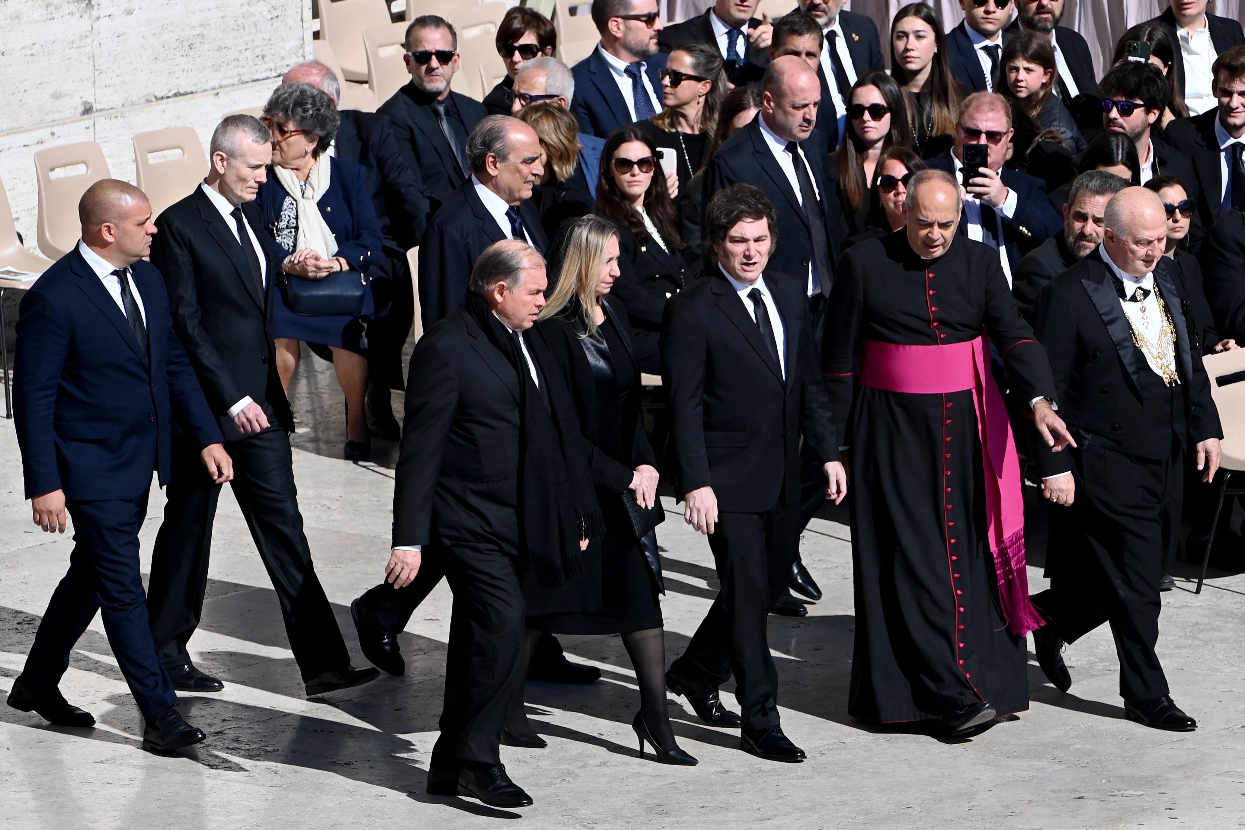 Argentina's President Javier Milei (CR) and General Secretary of the Presidency of Argentina, Karina Milei (CL) arrive for late Pope Francis' funeral ceremony at St Peter's Square in The Vatican on April 26, 2025. (Photo by Isabella BONOTTO / AFP)