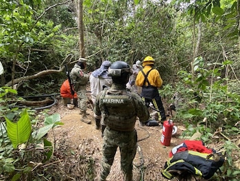 La toma se encontraba en una zona llena de maleza. Crédito: Marina