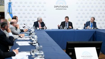 Massa y Domínguez con integrantes