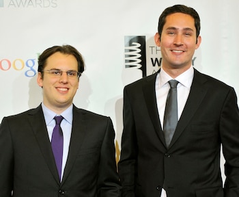 FILE PHOTO: Instagram founders Mike Krieger (L) and Kevin Systrom attend the 16th annual Webby Awards in New York May, 21 2012. REUTERS/Stephen Chernin (UNITED STATES - Tags: SCIENCE TECHNOLOGY ENTERTAINMENT)/File Photo