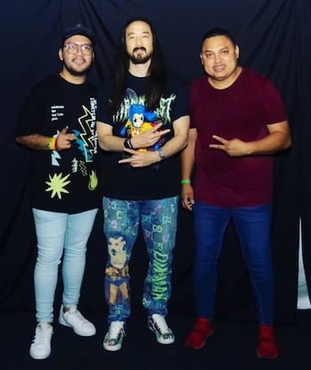 Mikhail López junto al reconocido