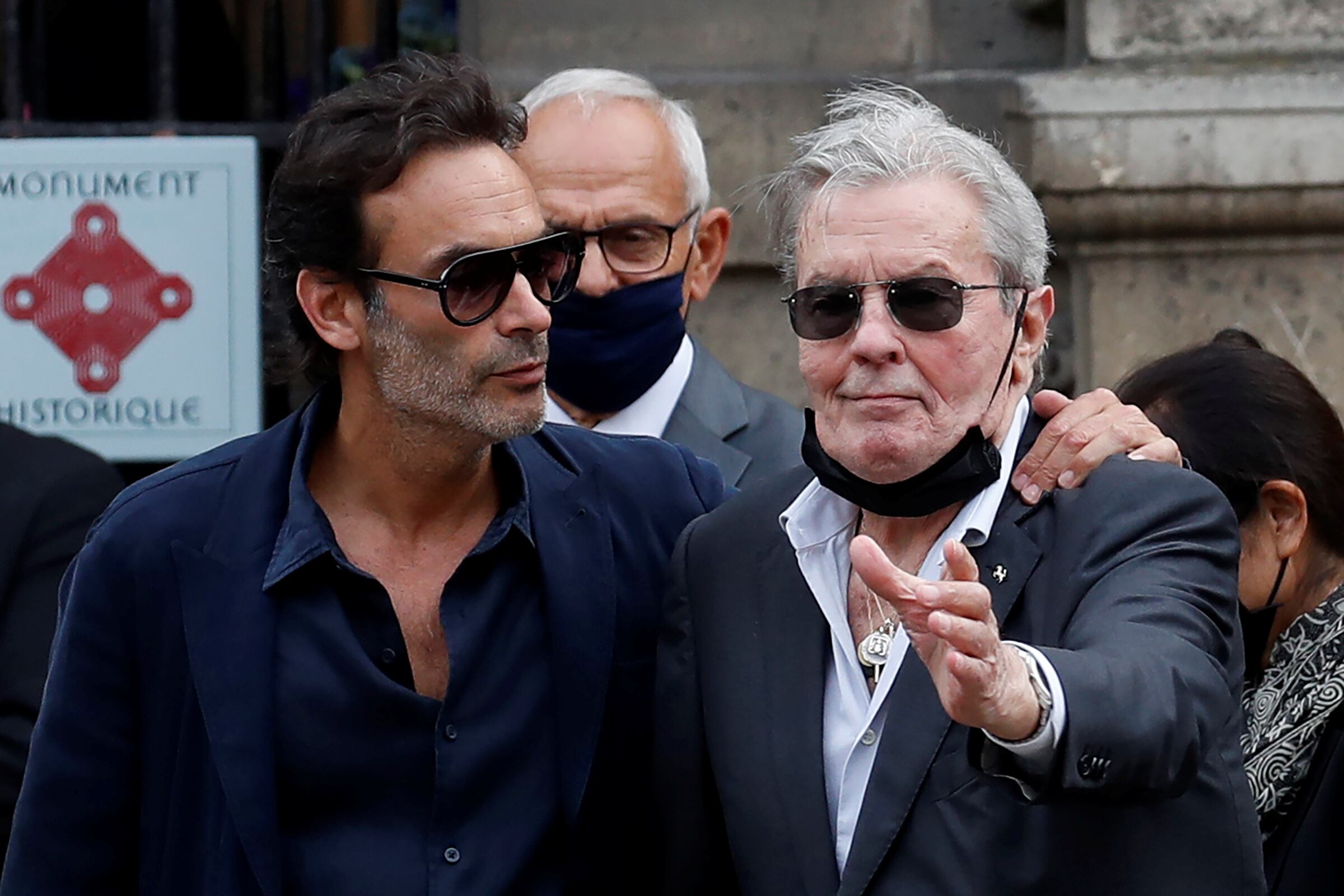 Alain Delon and his son Anthony Delon arrive to attend the funeral ceremony for late French actor Jean-Paul Belmondo at the Saint-Germain-des-Pres church in Paris, France, September 10, 2021. REUTERS/Gonzalo Fuentes