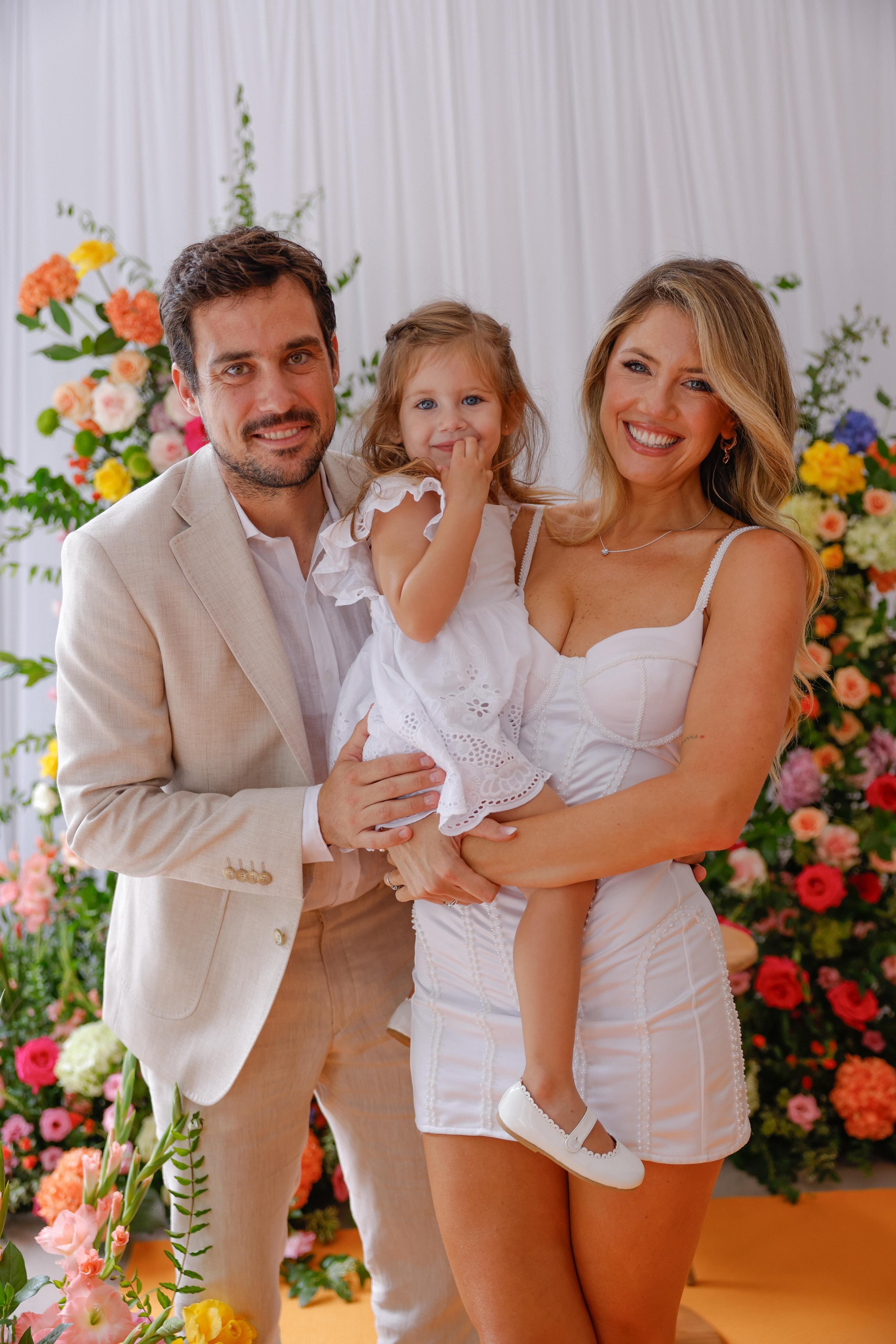 Demner, su esposo Guido Pella y la hija de ambos, Arianne