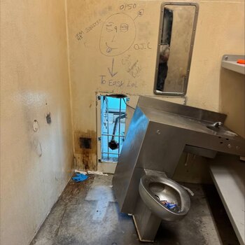 Seven Dangerous Prisoners Still at Large in New Orleans Hole behind toilet used in escape
