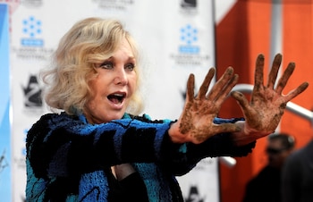 Kim Novak posa para los