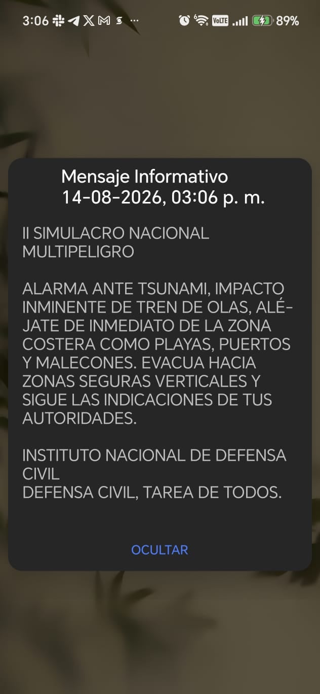 Un teléfono celular muestra la alerta de tsunami del INDECI enviada durante el II Simulacro Nacional Multipeligro 2026 en Lima y Callao.