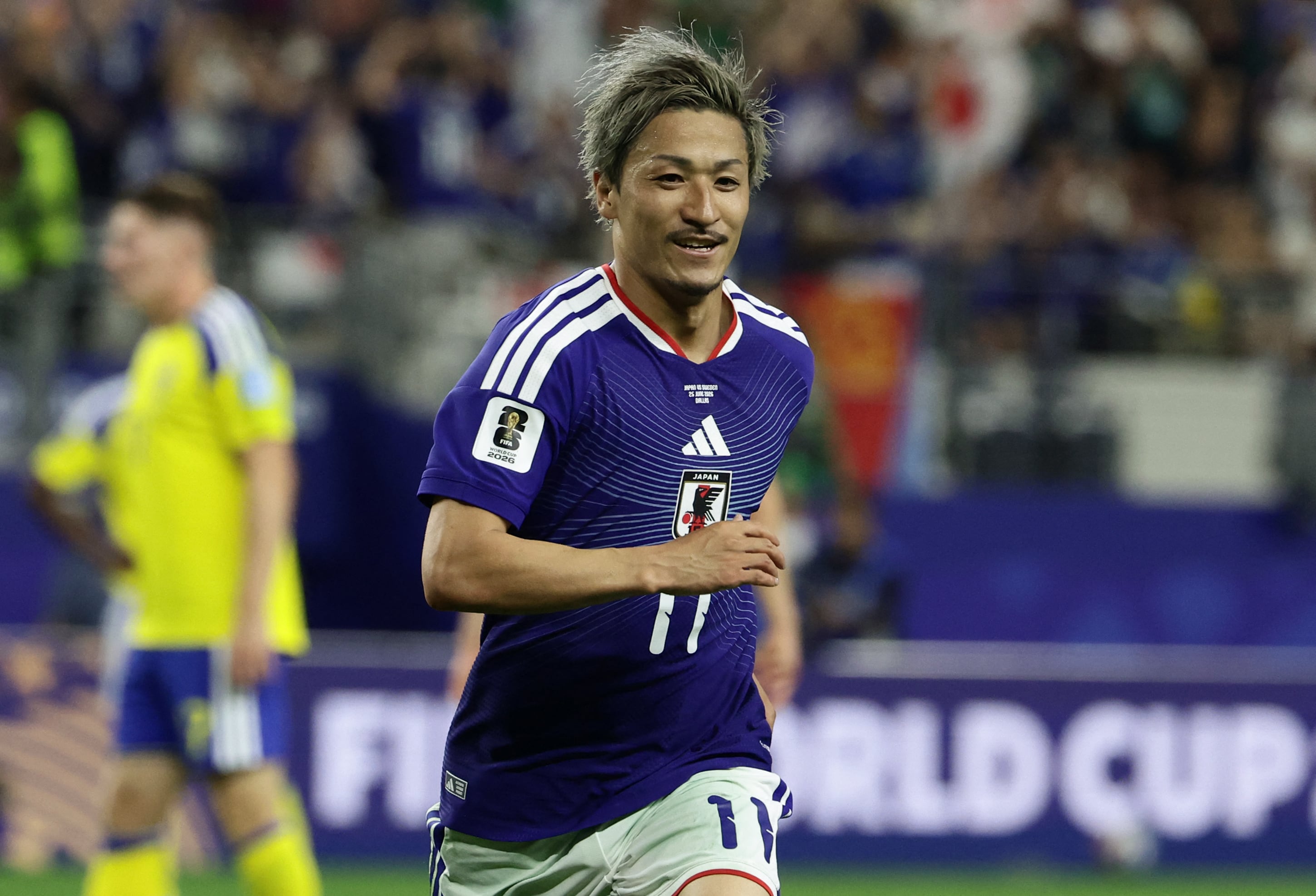 El japonés Daizen Maeda festeja el gol ante Suecia en fase de grupos del Mundial (Aric Becker / AFP)