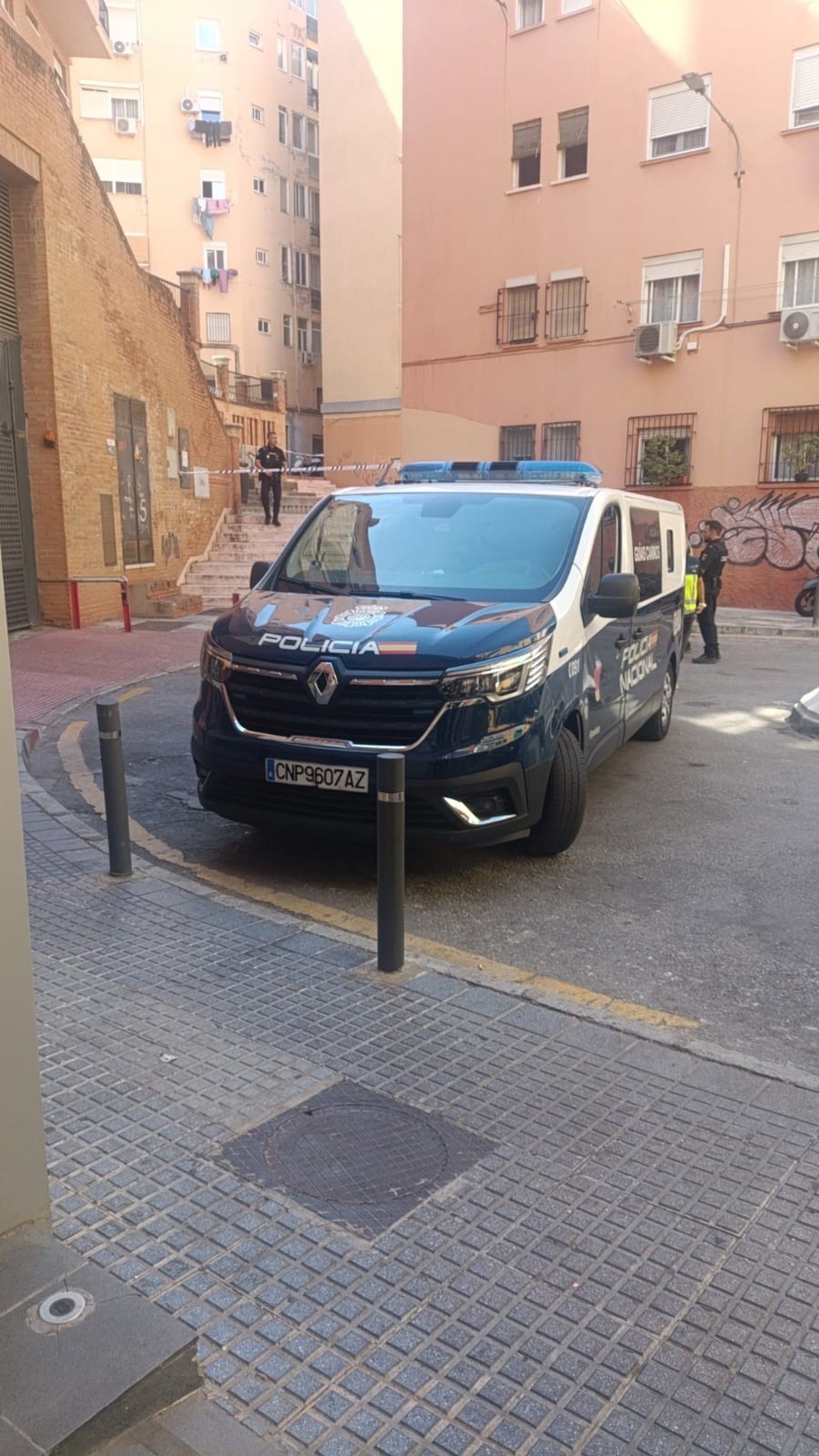 18/09/2026 Imagen de un coche de la Policía Nacional en la zona de Málaga donde se ha producido un tiroteo.
SOCIEDAD