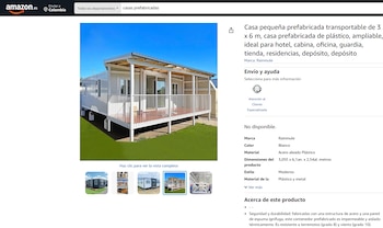 Captura de pantalla de Amazon.es, casa prefabricada blanca con porche y césped, logo Amazon, opciones de envío, detalles de producto