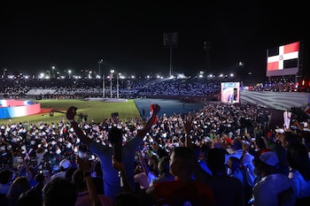 El público asistió a la inauguración para ser testigo del regreso de los Juegos a Santo Domingo, veinte años después. (EFE/ Orlando Barría)