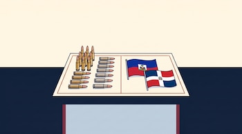Varias balas de diverso tamaño colocadas junto a las banderas de Haití y la República Dominicana sobre una mesa.