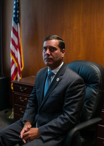 Timothy D. Sini, fiscal de