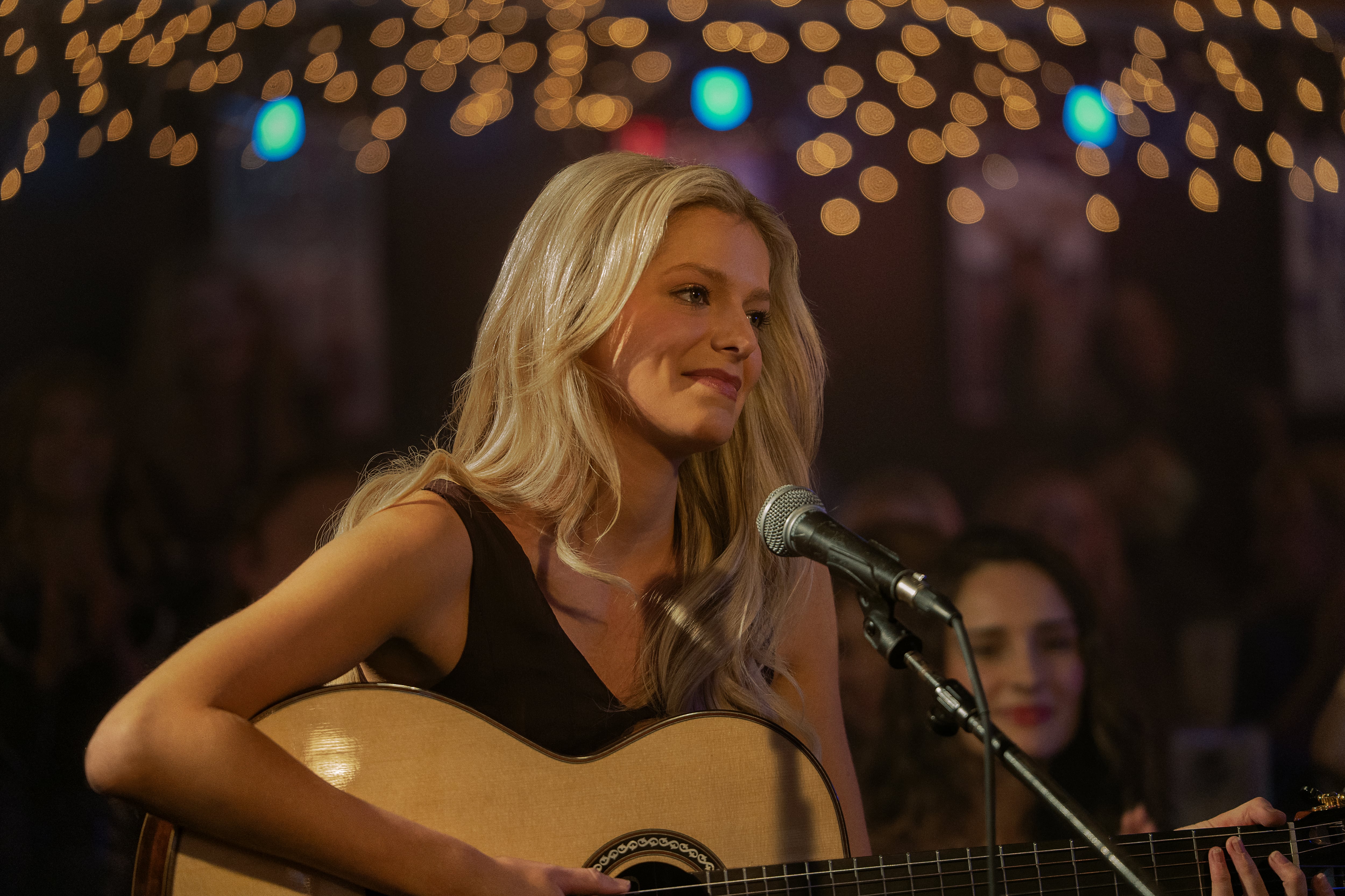 La trama de Heartland sitúa una investigación por desaparición en el costado menos visible de la industria musical. (Crédito: Tina Rowden/Netflix © 2026.)