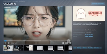 Captura de pantalla de la página del juego GAMEBORO con reproductor de video mostrando a una mujer con gafas que proyectan texto, logo, descripción y etiquetas