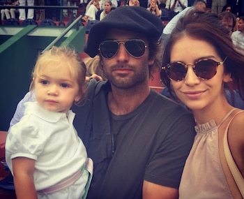 La pareja junto a su primera hija, Malaika, en un evento público