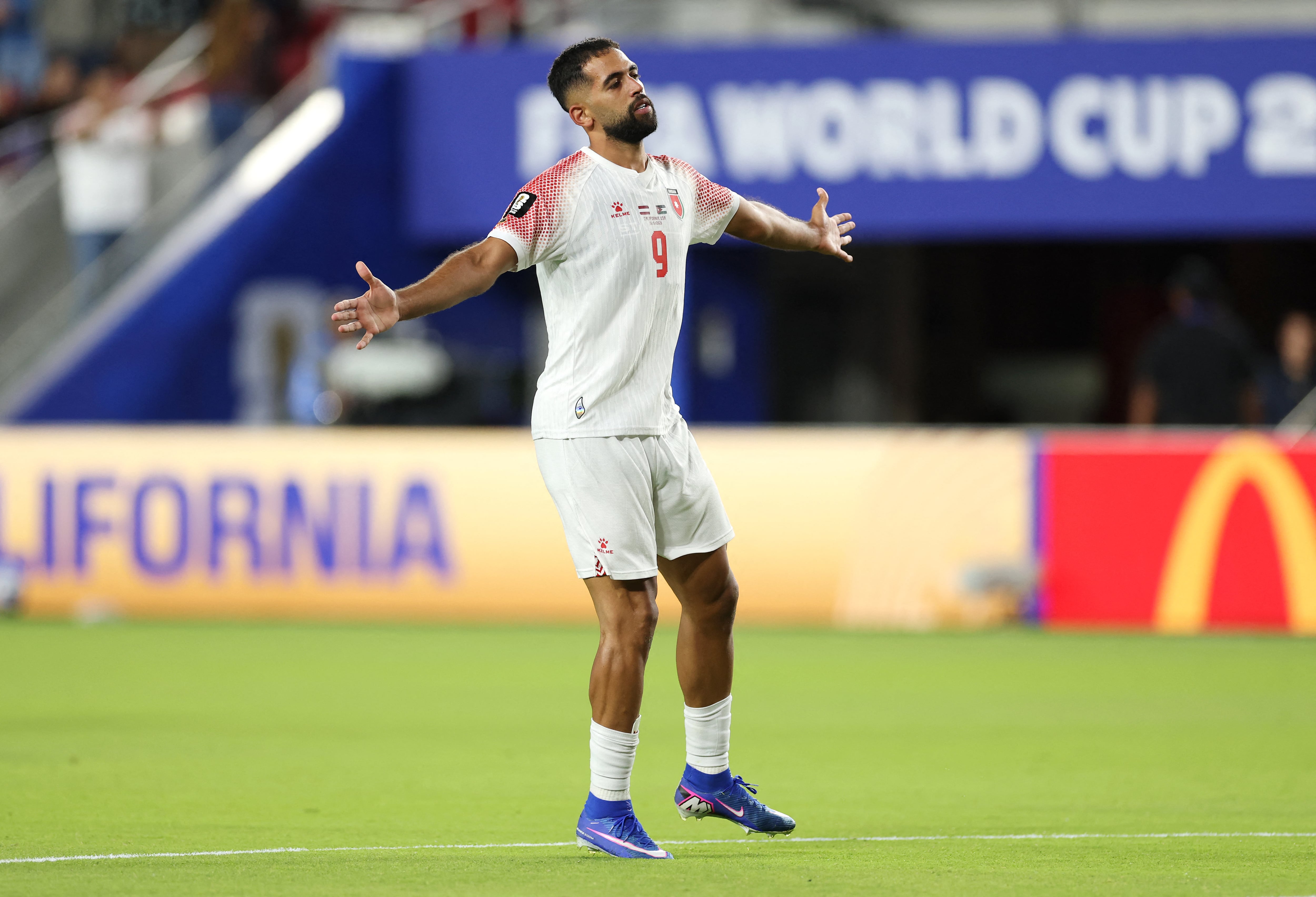 Ali Olwan, ícone do futebol da Jordânia (Foto de Richard HEATHCOTE/Foto de Richard HEATHCOTE/GETTY IMAGES NORTH AMERICA/Getty Images via AFP)