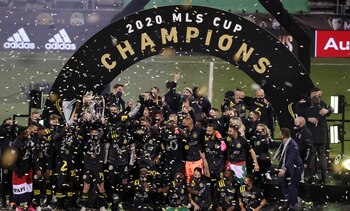 FILE PHOTO: Dec 12, 2020; Columbus, Ohio, USA; Columbus Crew defender Milton Valenzuela (19) hoists the MLS Cup championship trophy after defeating the Seattle Sounders in the 2020 MLS Cup Final at MAPFRE Stadium. Mandatory Credit: Trevor Ruszkowski-USA TODAY Sports/File Photo