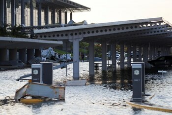 A man wades through water