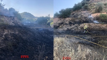 Dos dotaciones de bomberos trabajan en la superficie quemada en Ponts (Lleida).